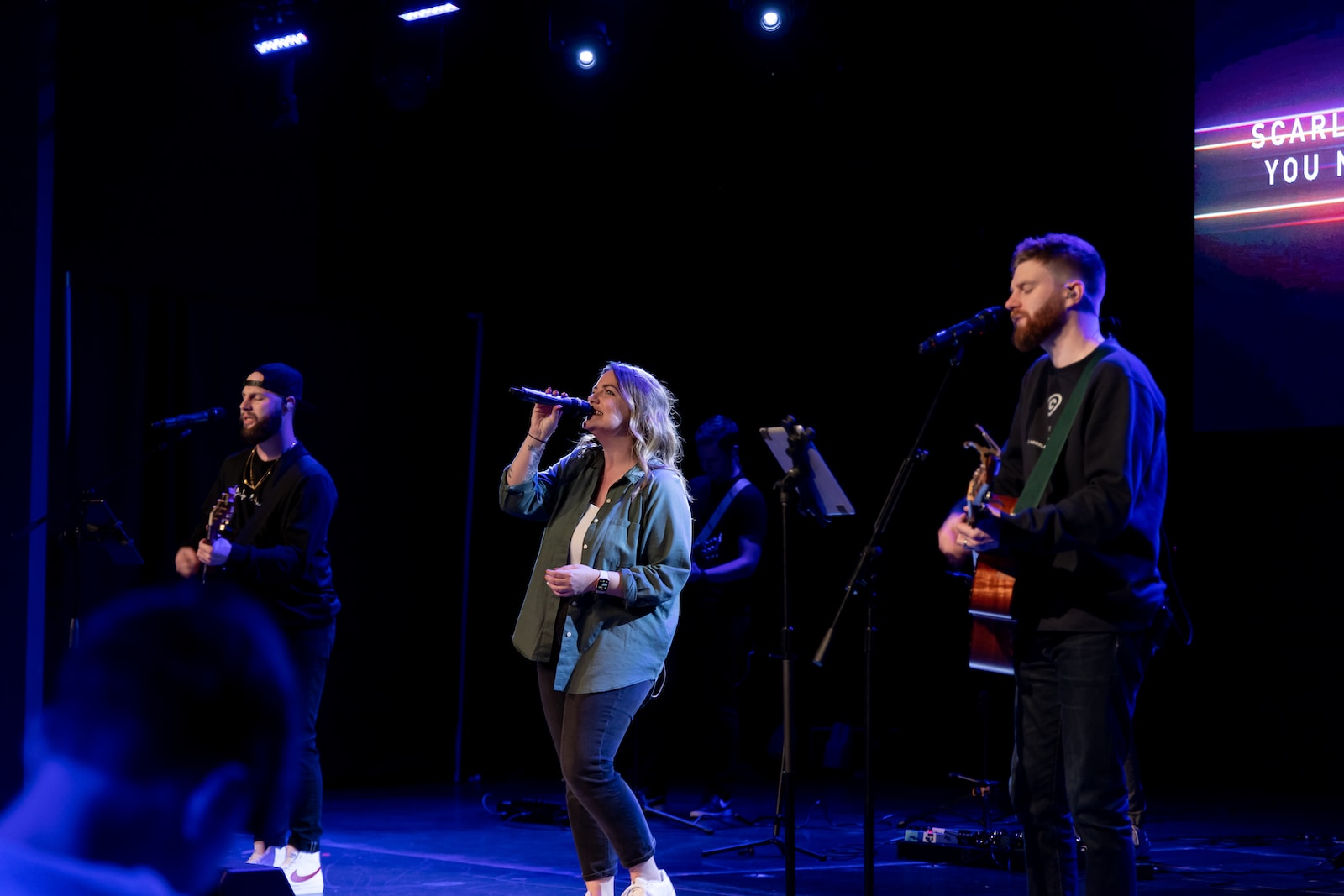 a group of people on a stage